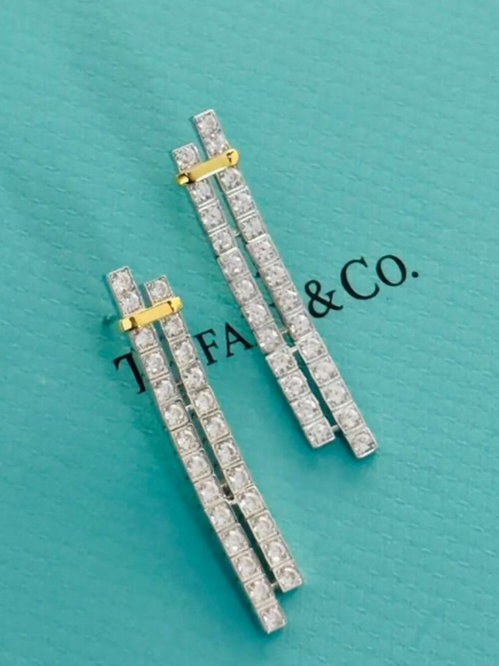 Tiffany & Co. long diamond stud earrings